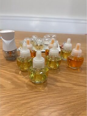 Air Wick Essential Oils Plug-In Scented Oil Warmer with Multiple Refills